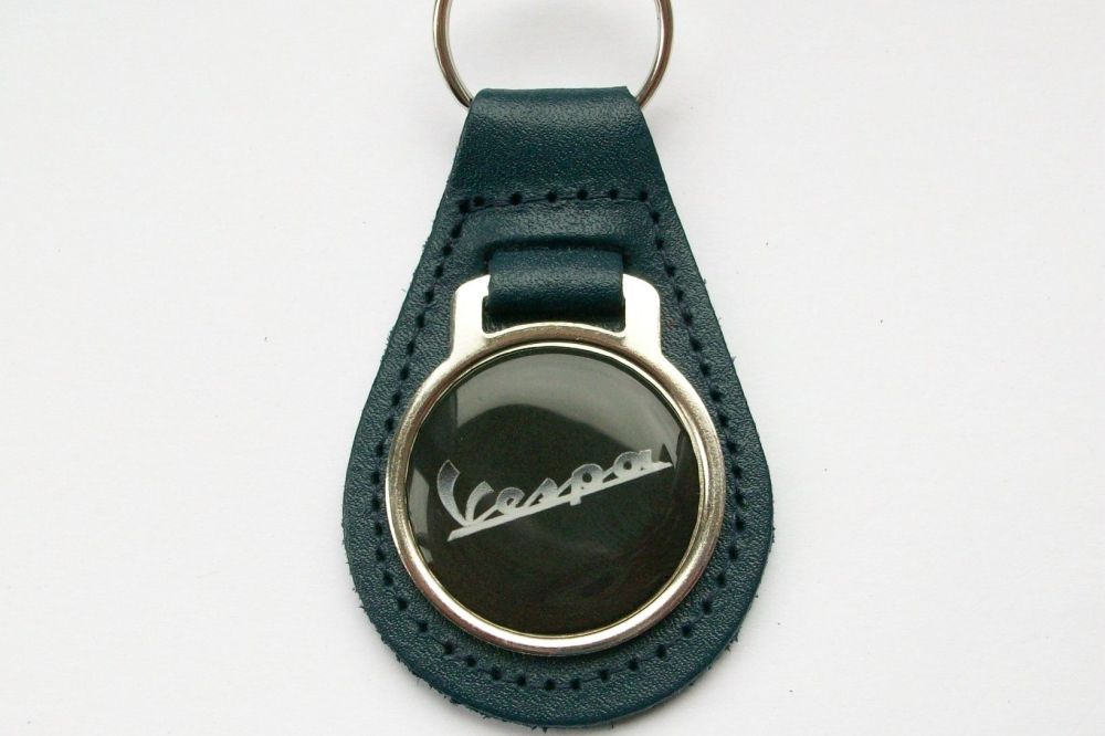 Vespa acrylic badged blue leather keyring..