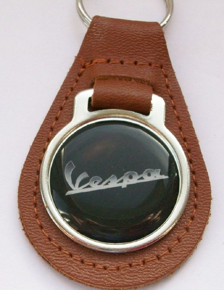 Vespa acrylic badged tan leather keyring..