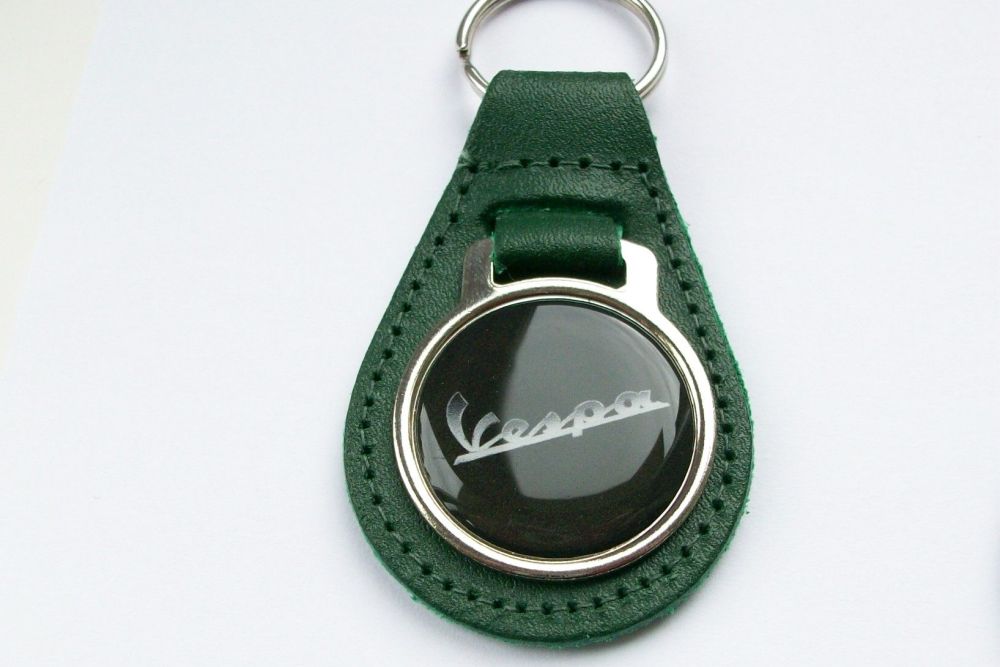 Vespa acrylic badged green leather keyring..