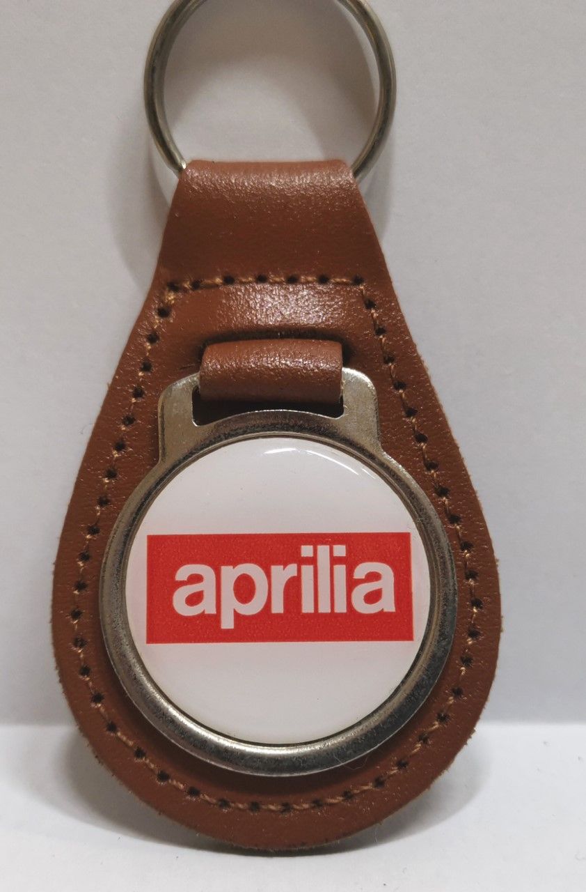Aprilia acrylic badged tan leather keyring