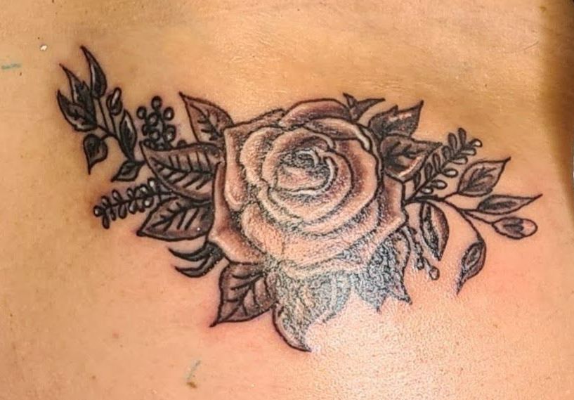 beautiful wispy rose tattoo