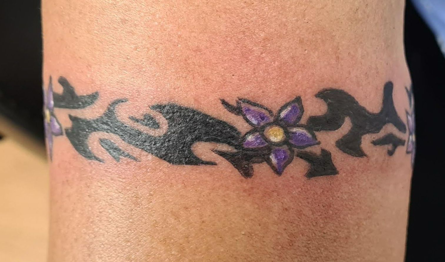 flower tribal band tattoo