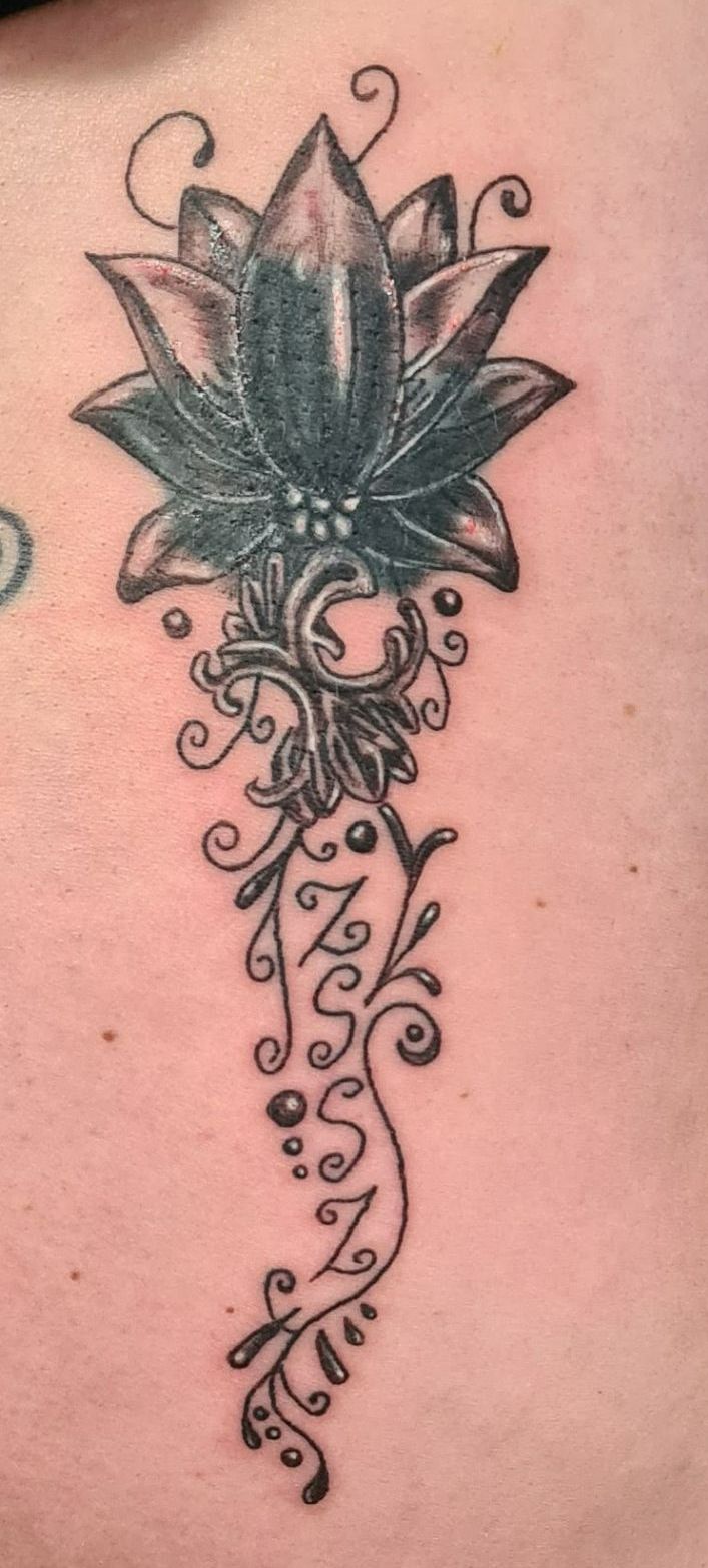 lotus flower cover up tattoo