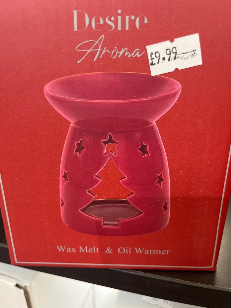 Red cut out Xmas tree burner