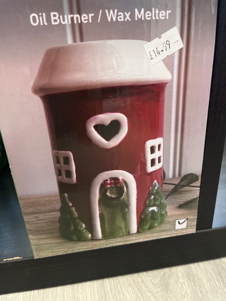 Red cyclindrical Xmas house burner