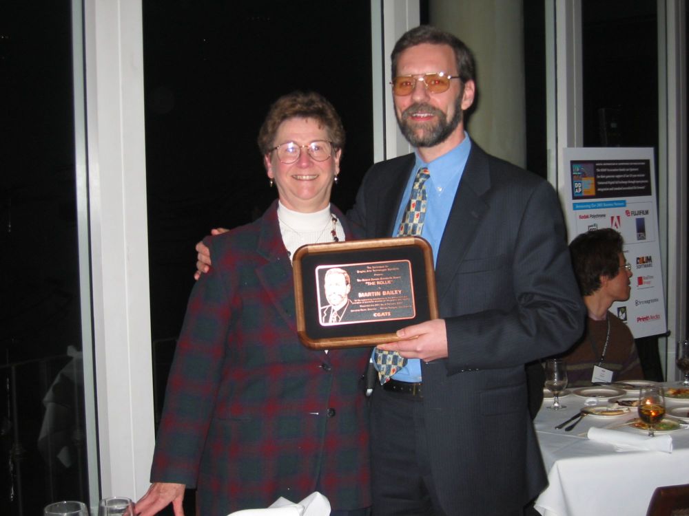 Martin Bailey was awarded a "Rollie", CGATS' Roland Zavada Standards Award in 2002, presented by Mary Abbott, without whom TC130/WG2 would never have gotten ourselves organized.