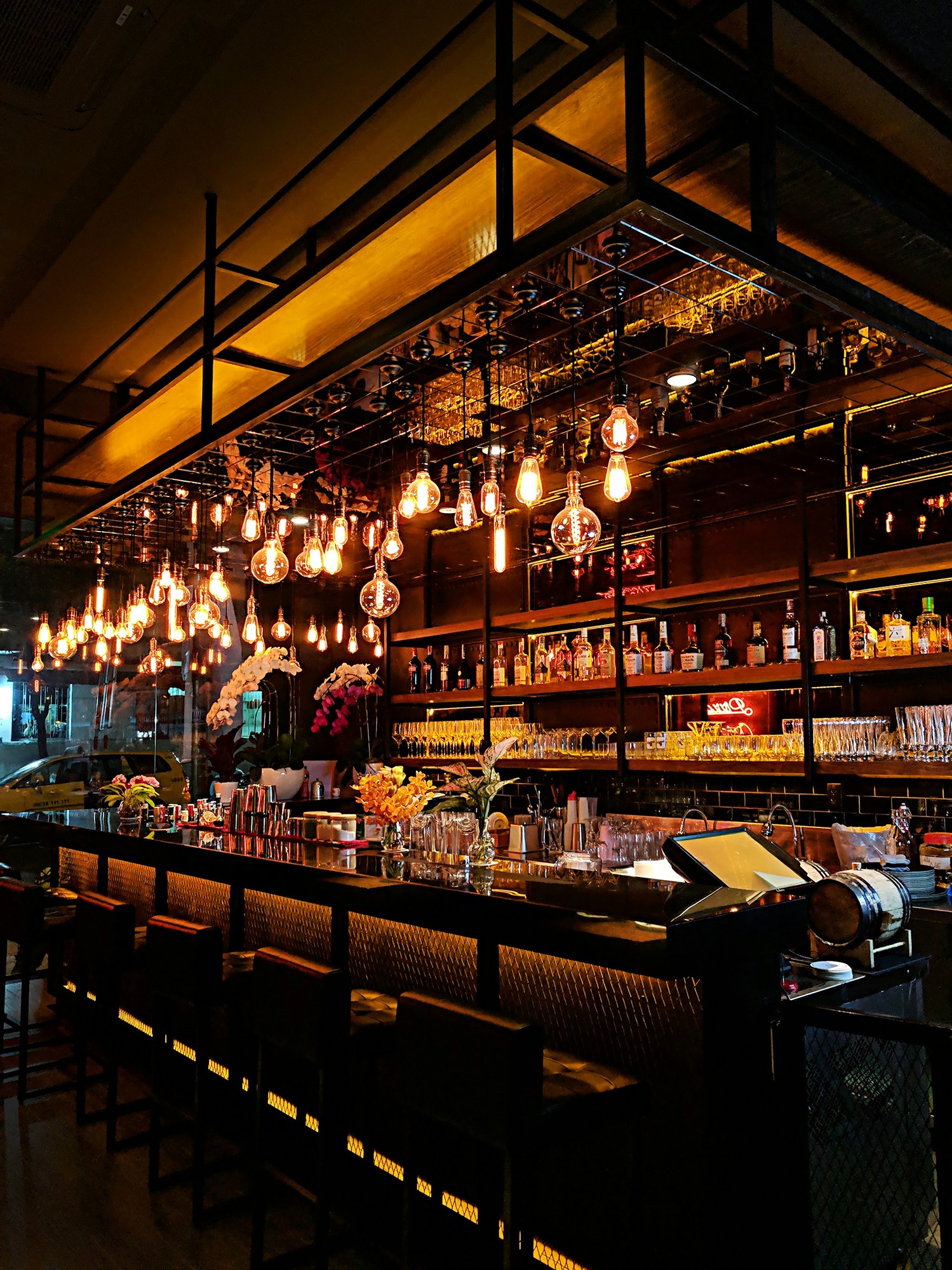 turned-on-filament-bulb-lights-at-bar-counter-Zrp9b3PMIy8.jpg