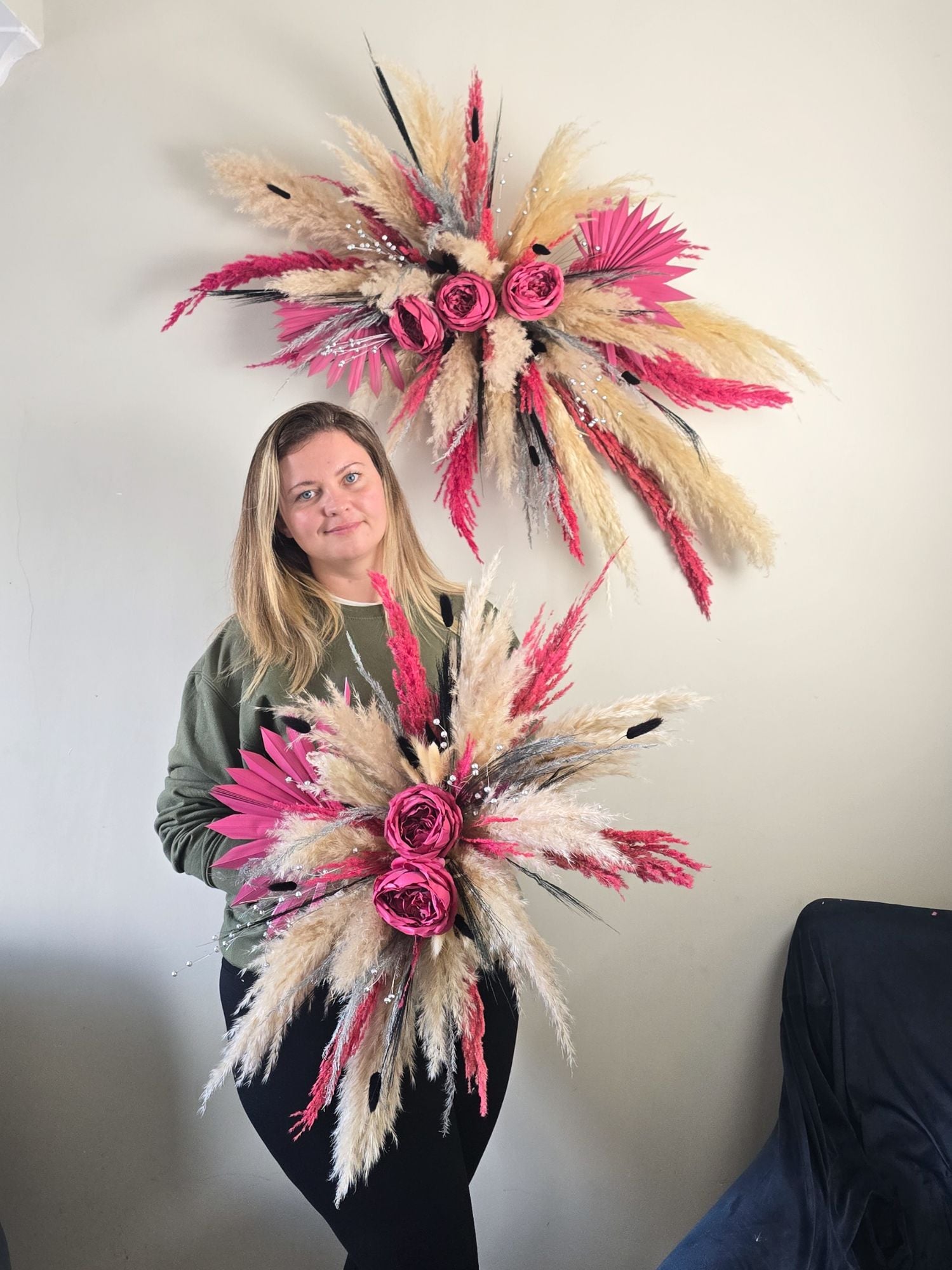 pink and black pampas grass wall decoration
