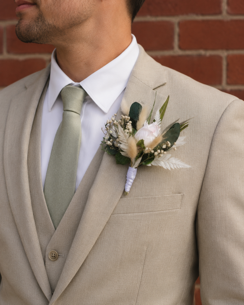 White & Dark Green Dried Buttonhole