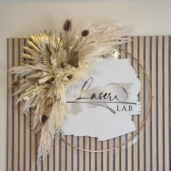 laser labs salon sign with pampas grass decor