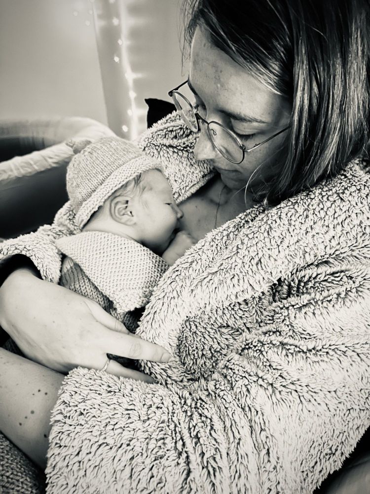 New Mum and newborn son after their hypnobirthing homebirth in London