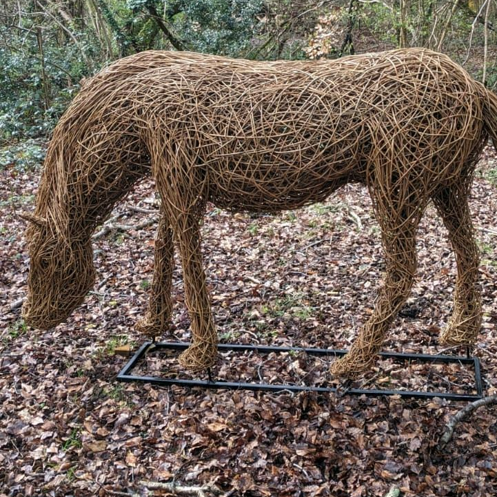 sculpture  of a New Forest  pony created in willow side view  head facing to the left