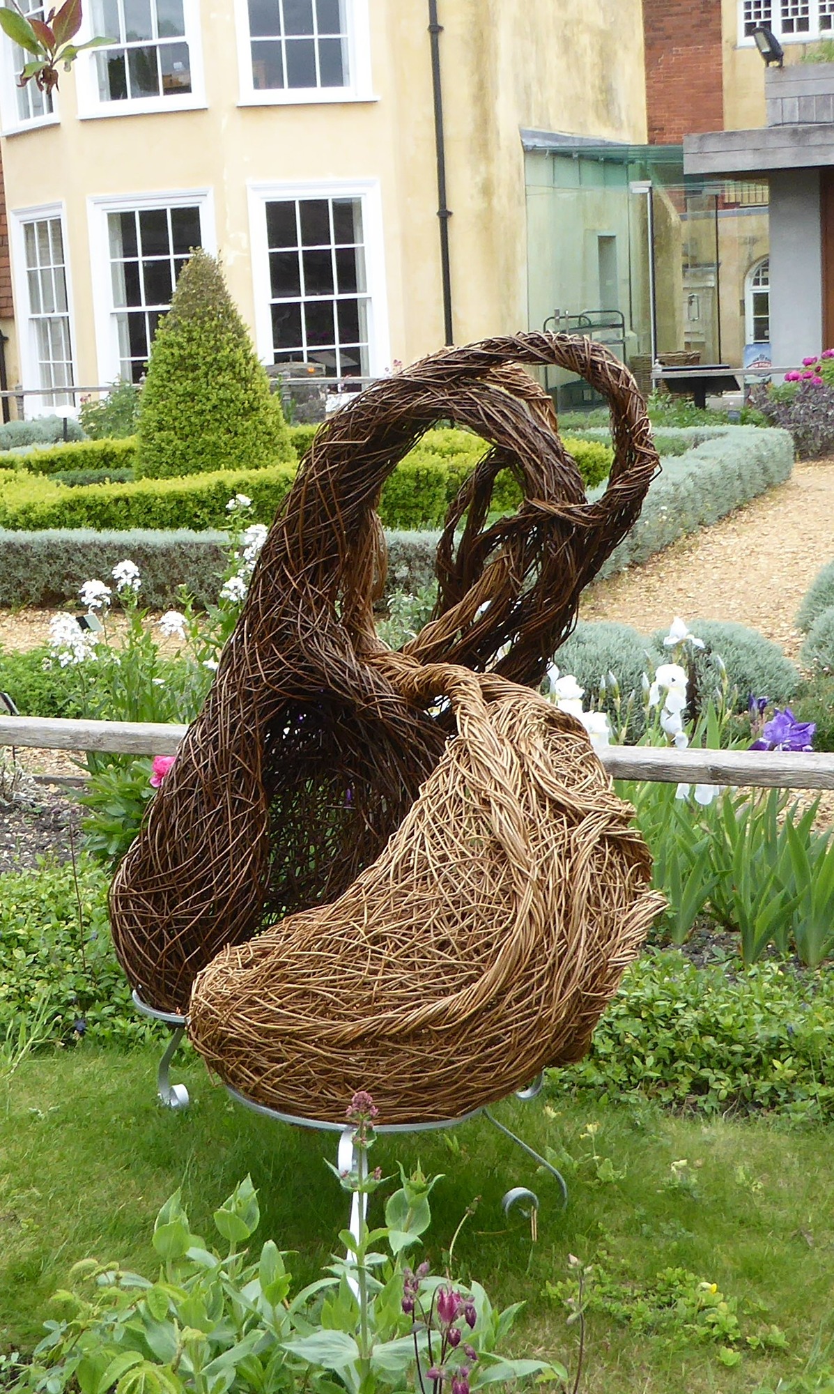 Willow sculptures on repurposed  mettal frame 