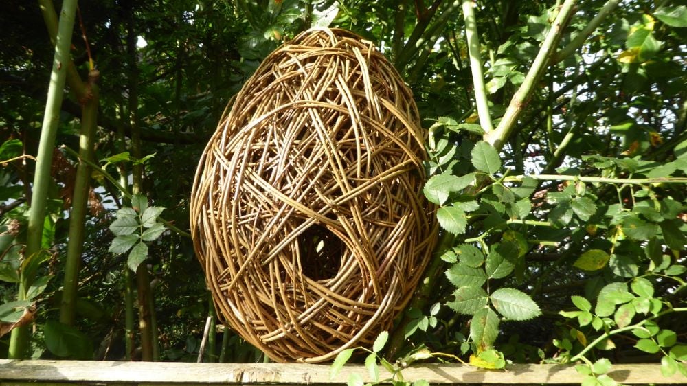 Garden items - willow birdhouses, dragonflies etc