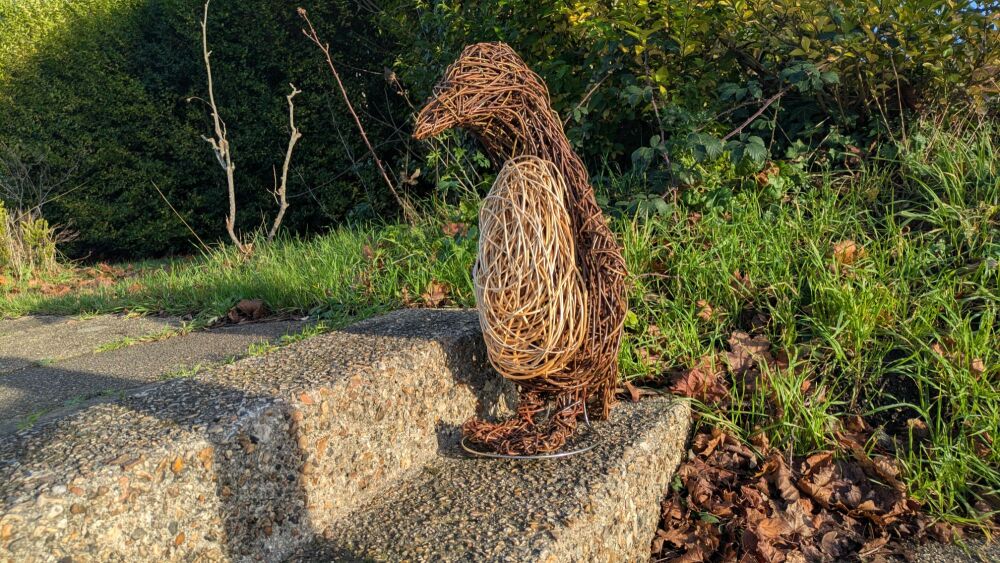 Willow penguin sculpture