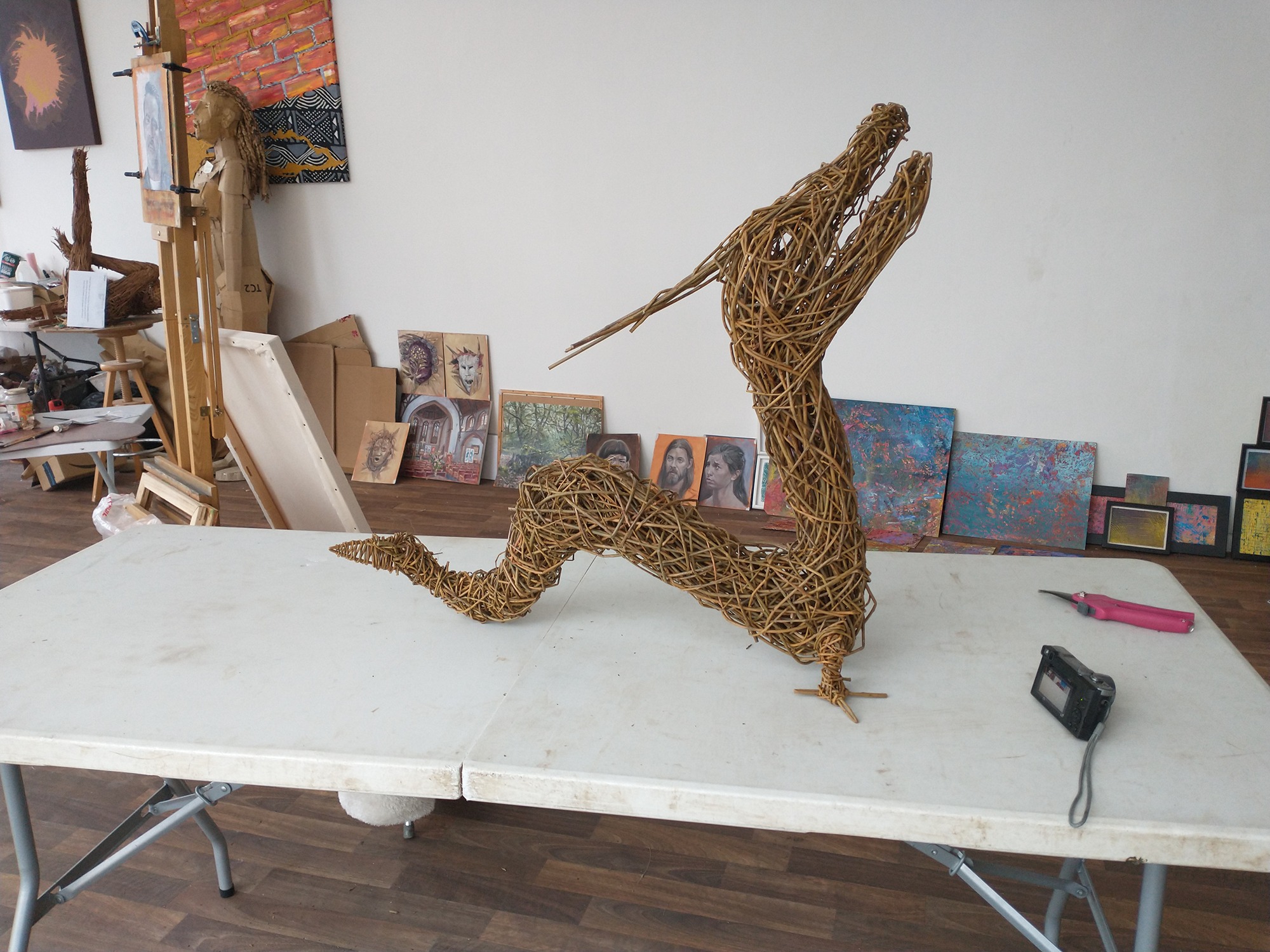 small willow dragon looking towards heaven