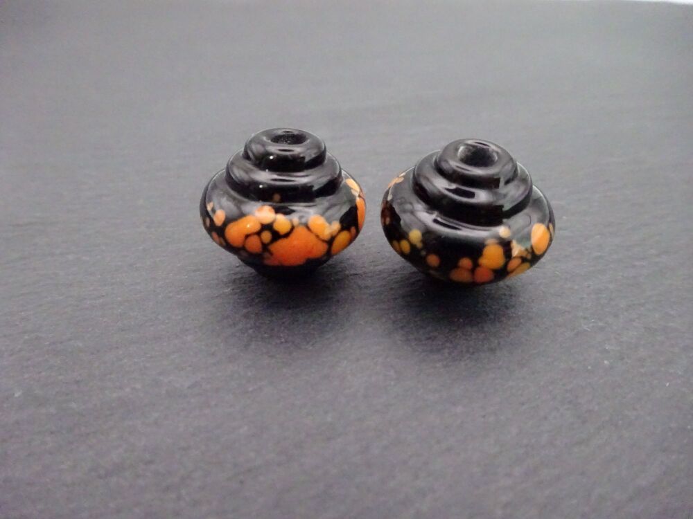 black ornate orange frit