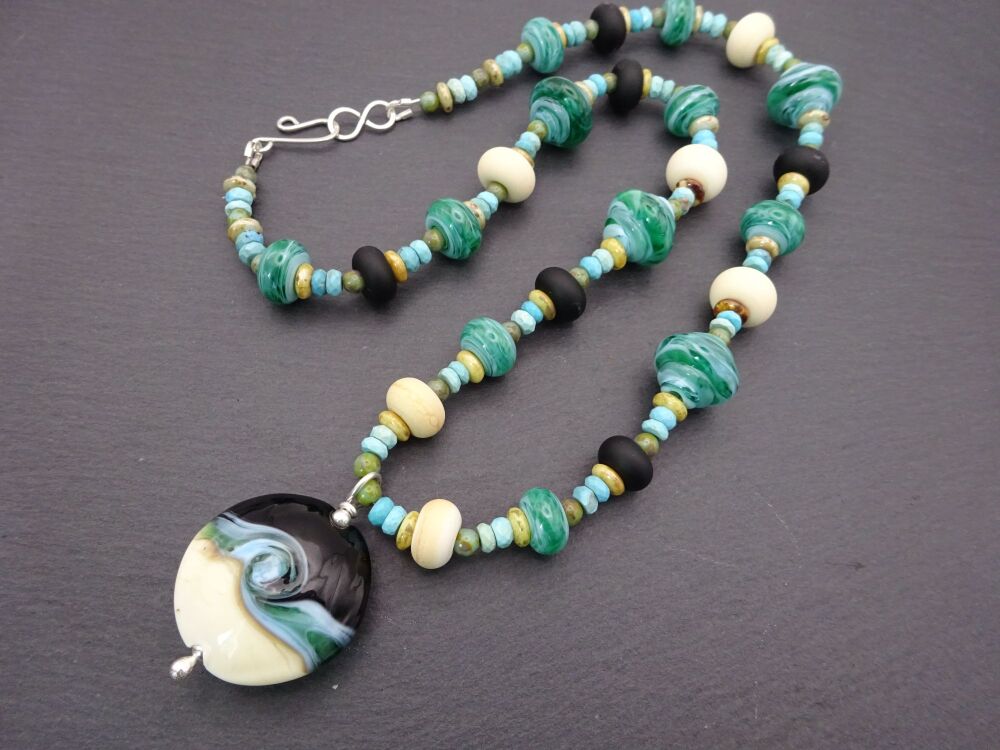 black and green sea pendant