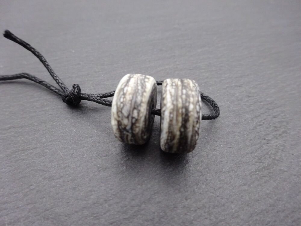 black mottled discs