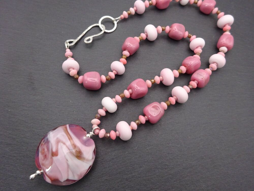pink and goldstone