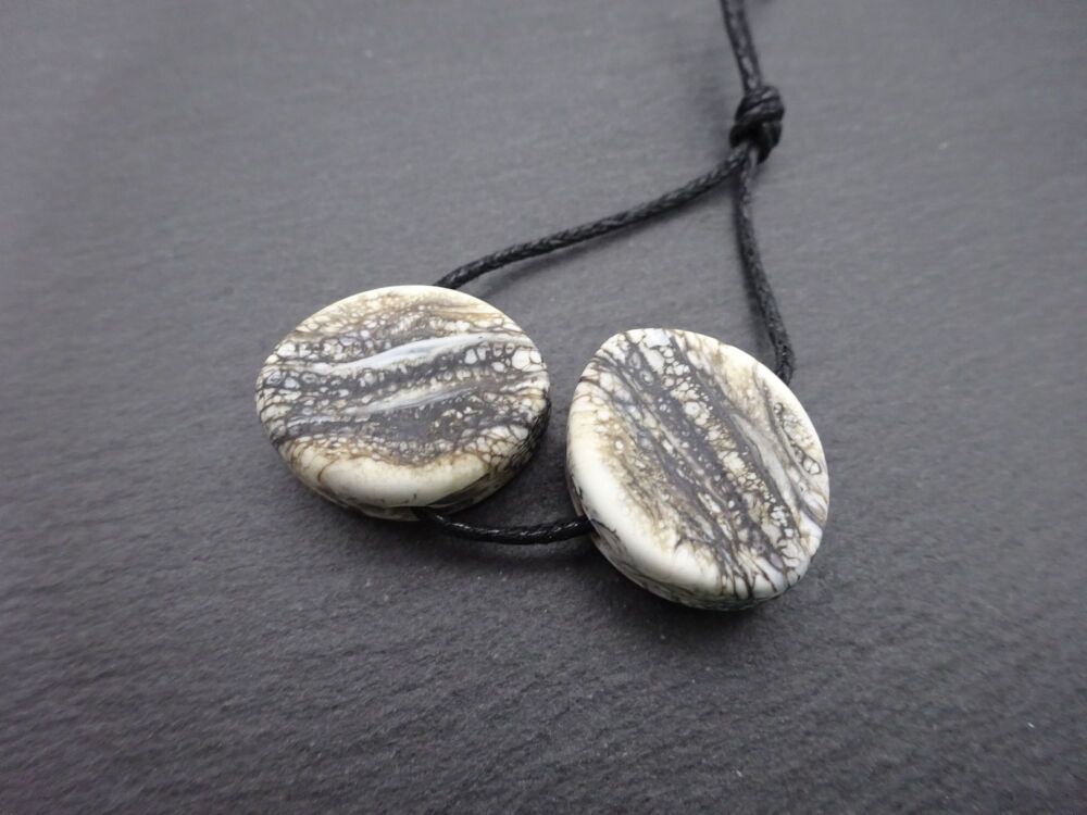 ivory mottled ovals