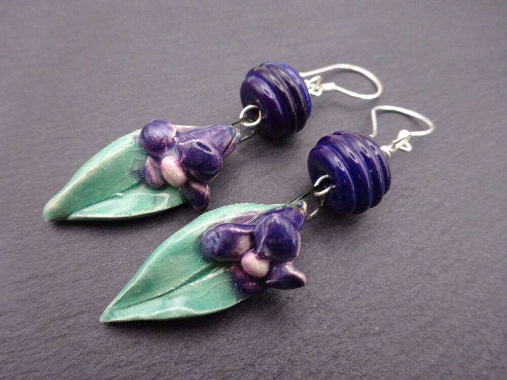 purple flowers with leaves