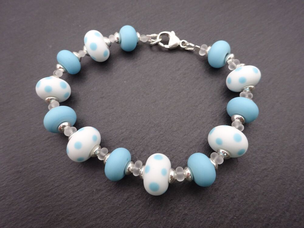 white and blue polka dots