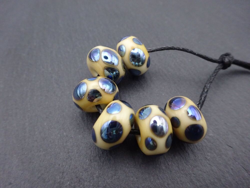 ivory and silver blue spots