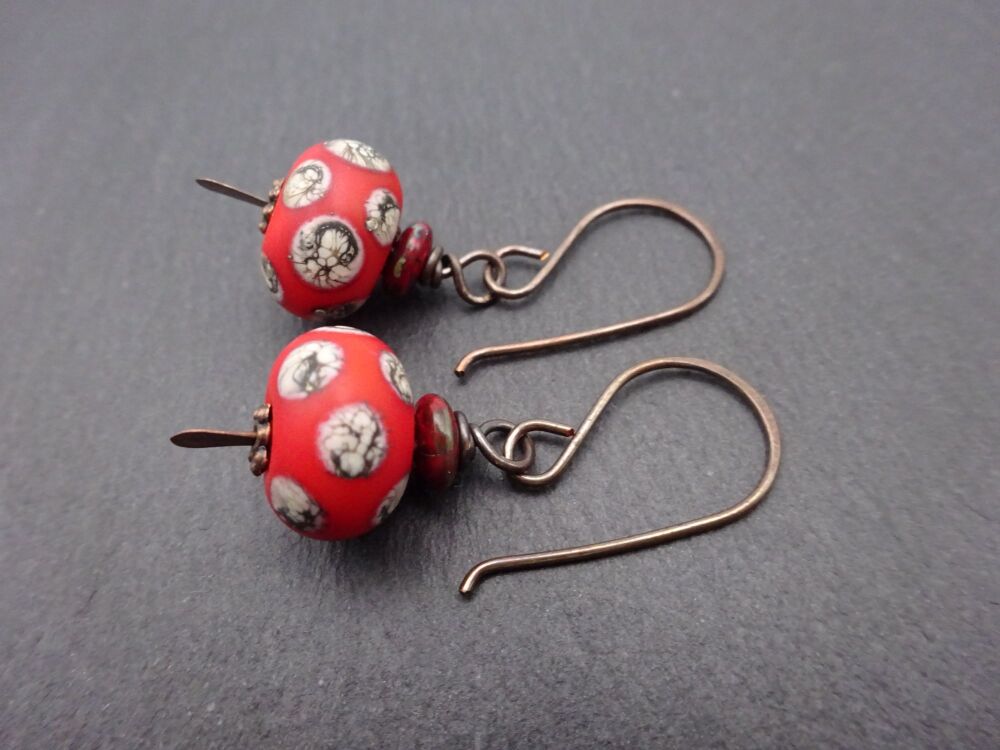 red orange and ivory spots