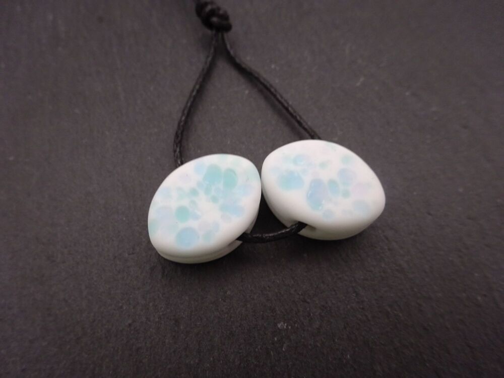 white and blue frit ovals