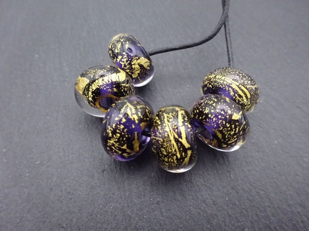 purple and gold leaf encased