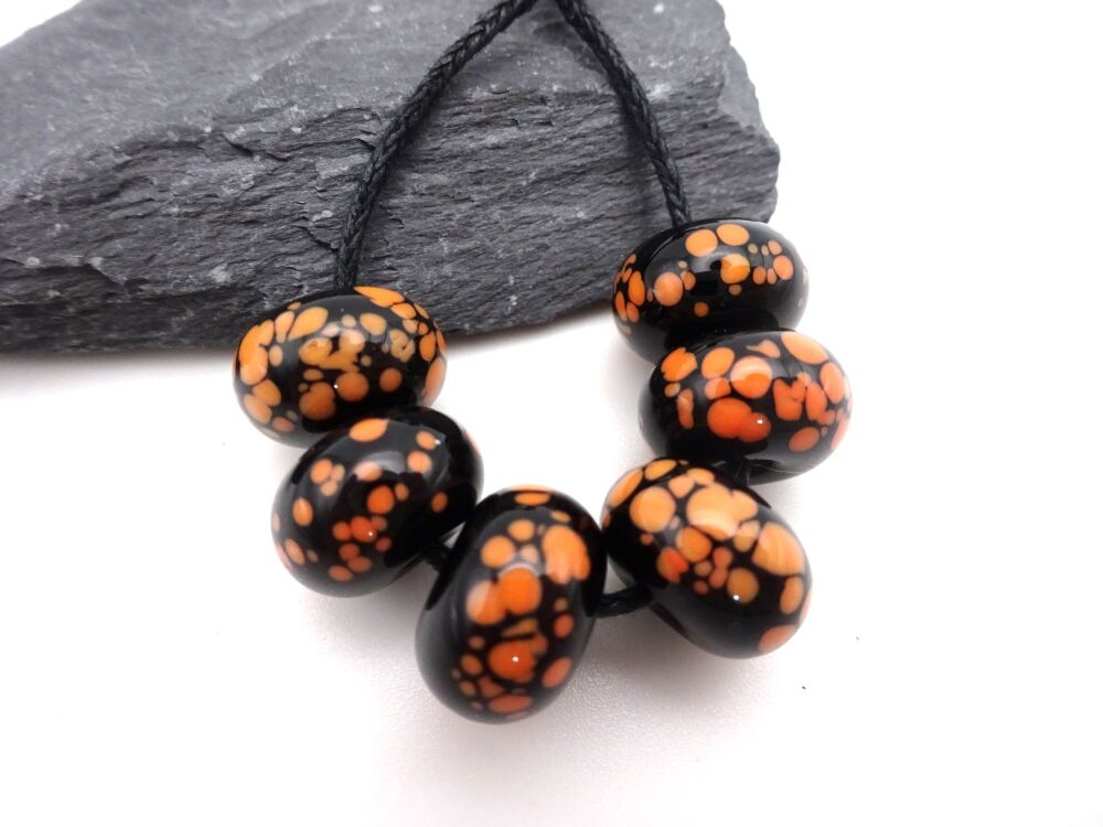 black with orange frit