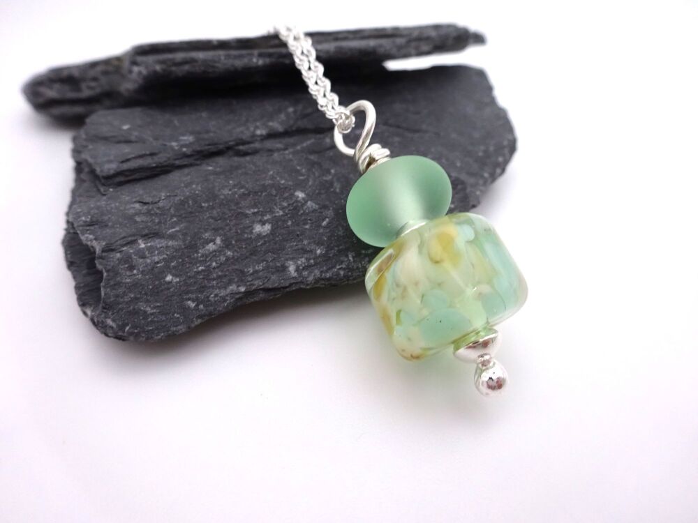 pale green and brown pendant