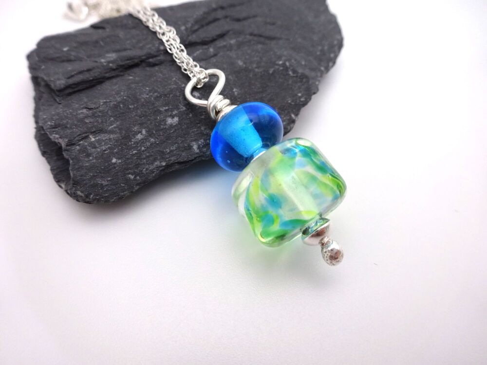 green and blue pendant