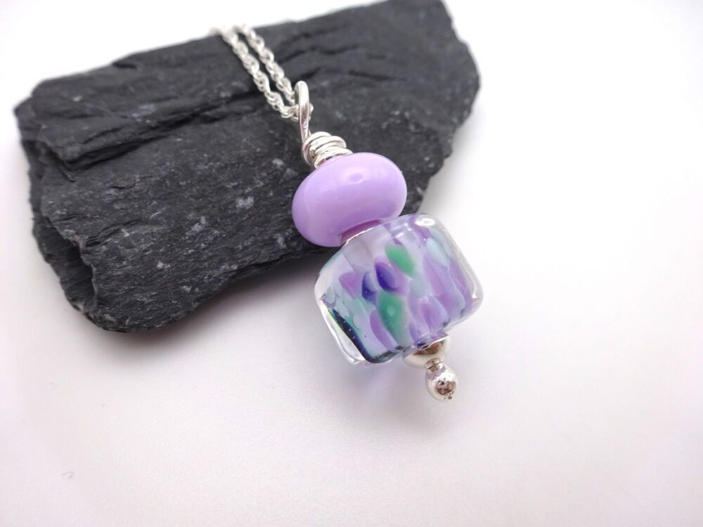 purple and green pendant