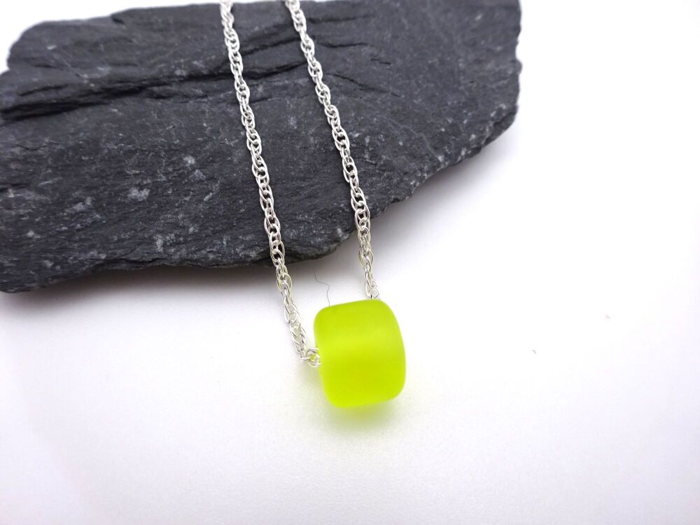 tiny yellow pendant