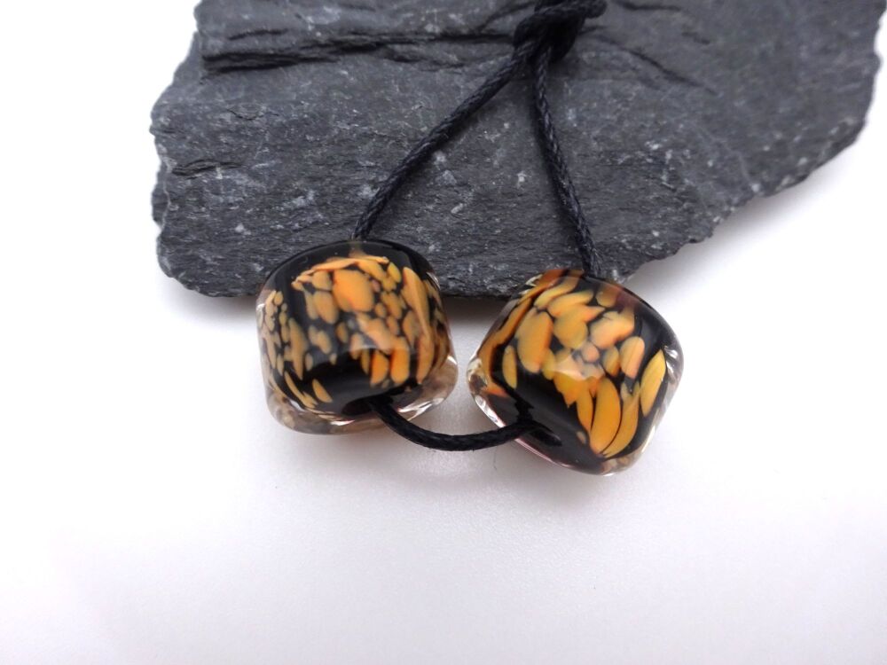 black and orange encased