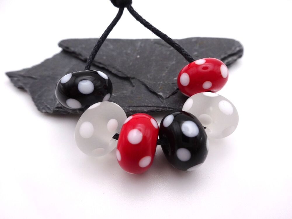 red, black and clear polka dots
