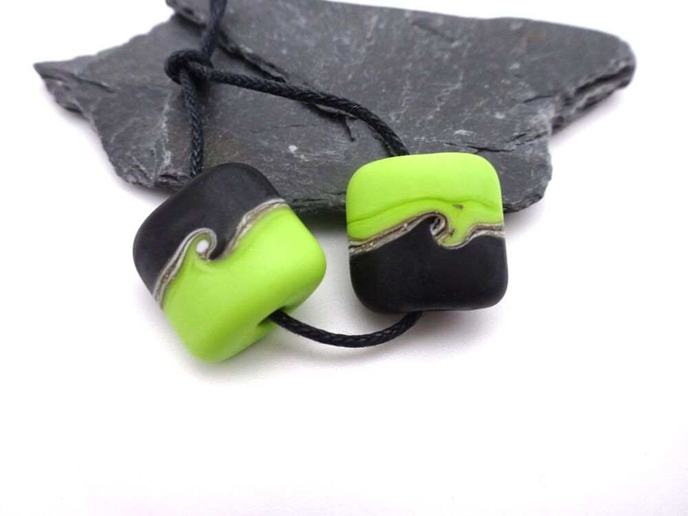 lime green and black pillows