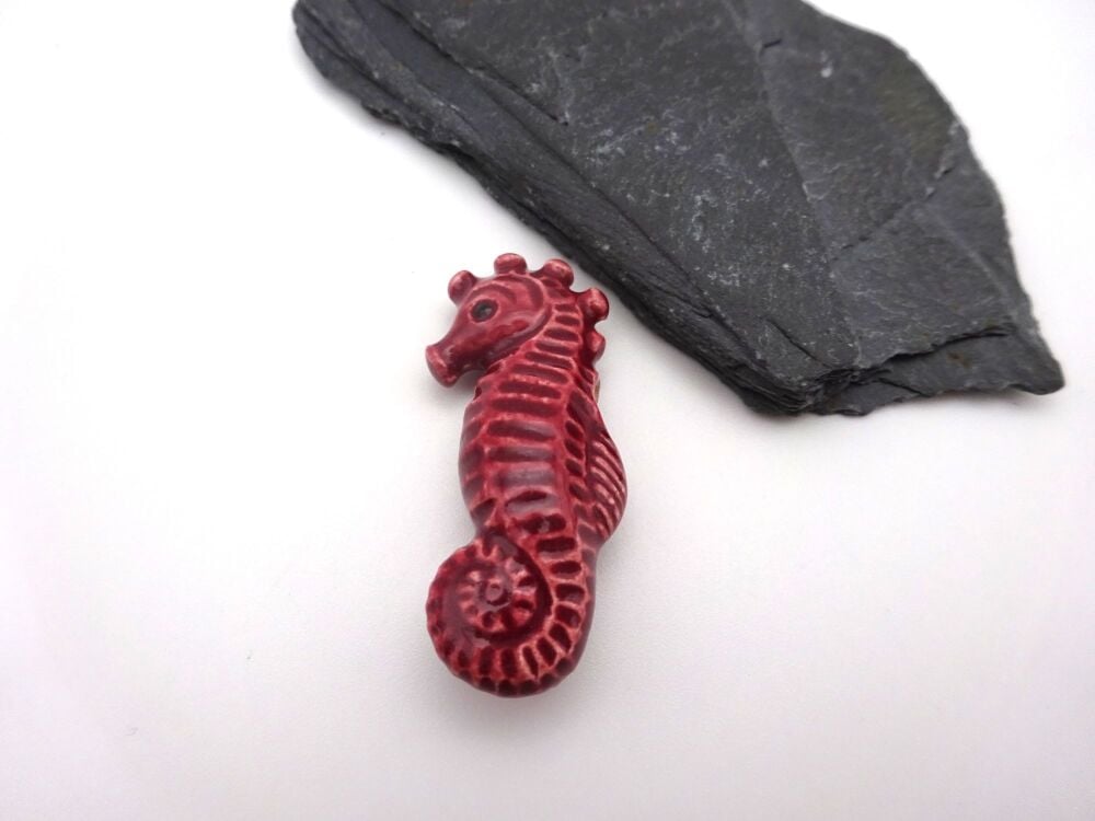 red ceramic seahorse