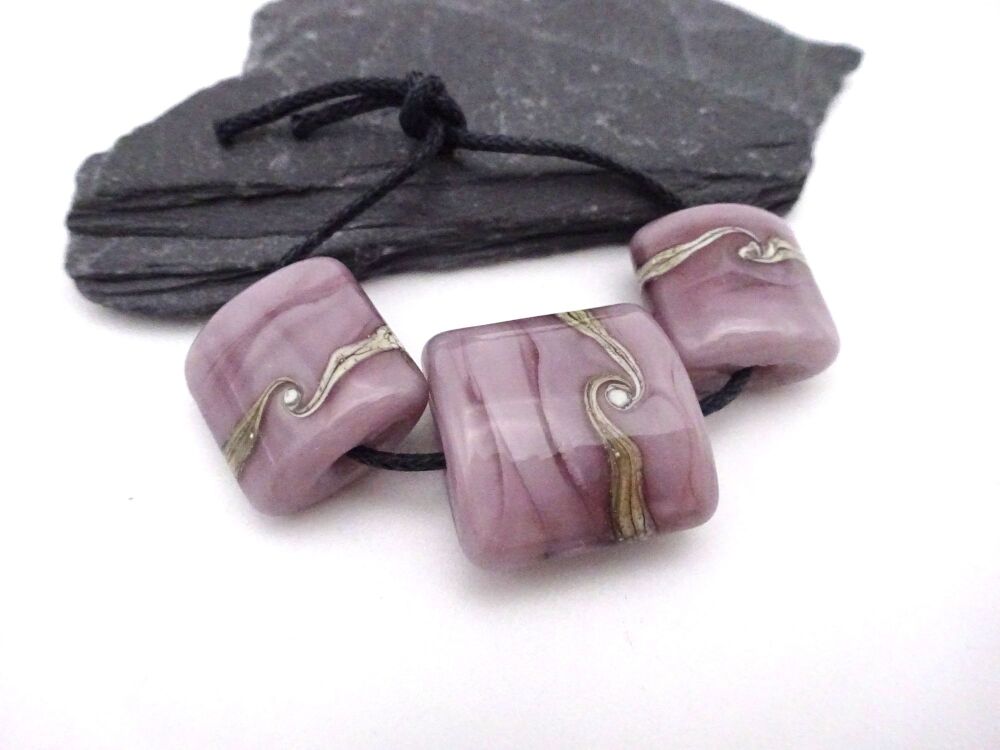 purple wrapped pillows