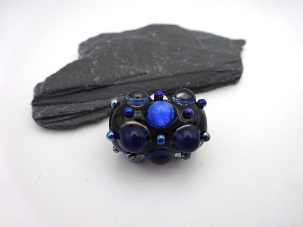 black and blue raised dots