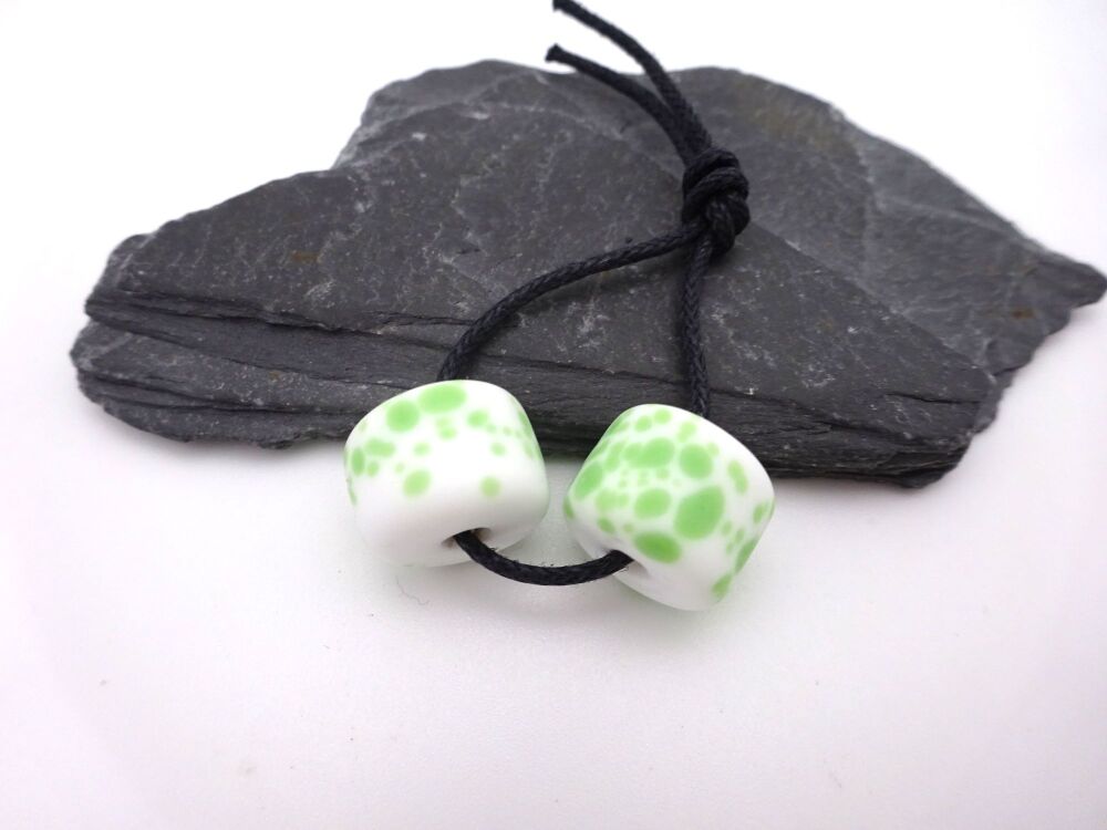 white and green frit wheels