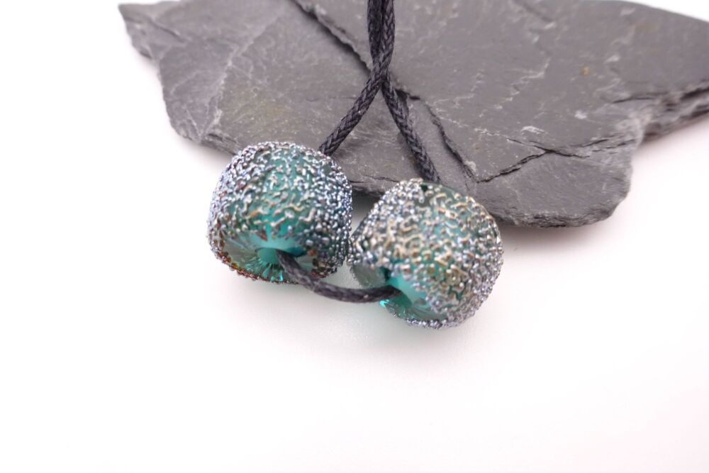 teal and silver chunky wheels