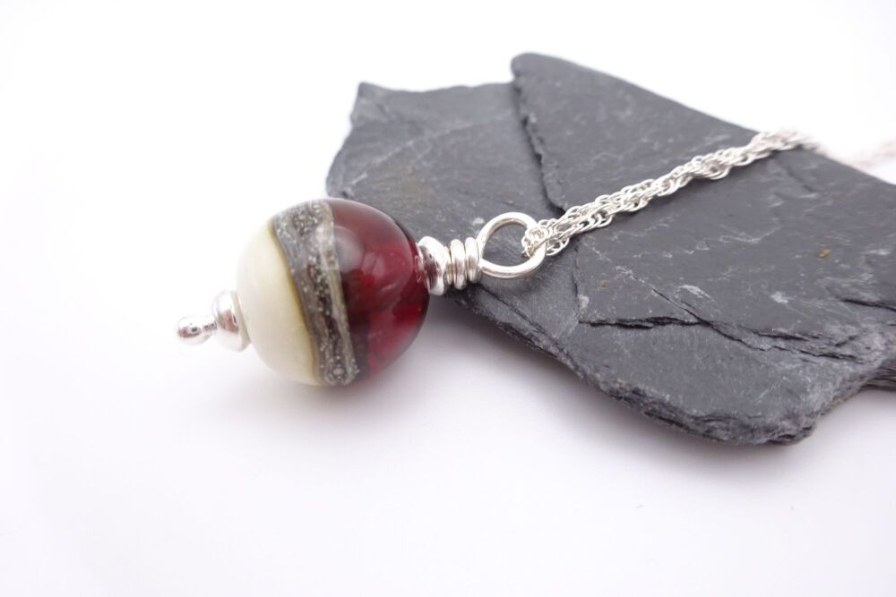 red and ivory sphere pendant