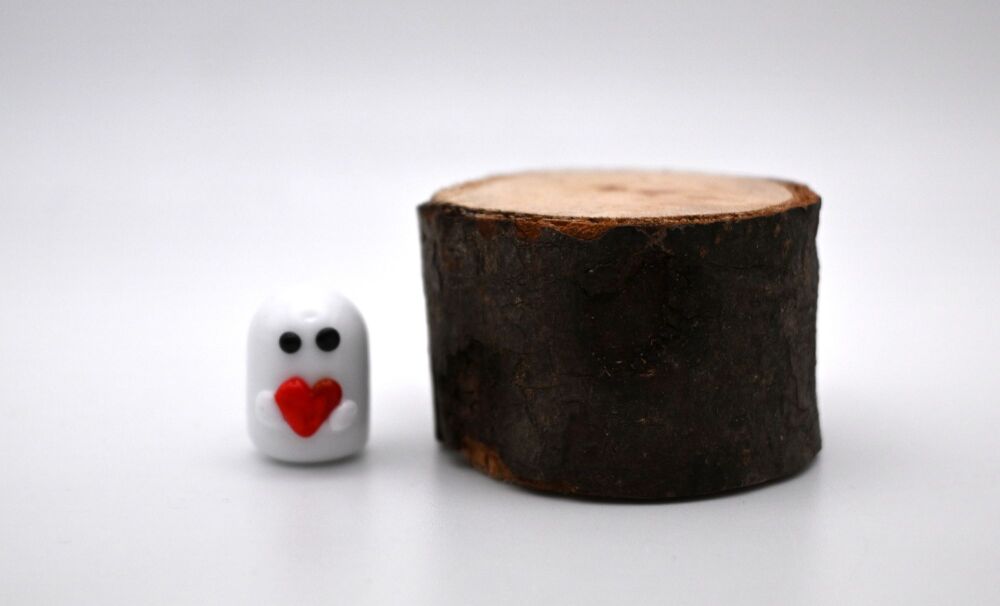 small ghost with heart