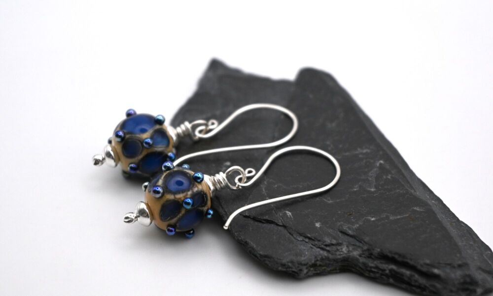 metallic blue raised dots