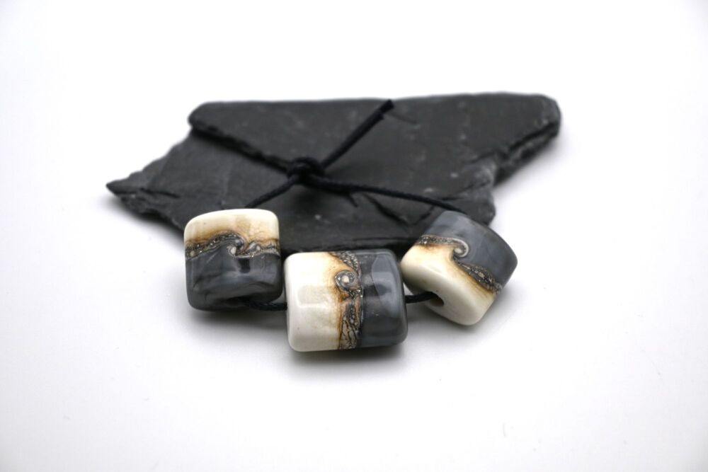 grey and ivory pillows