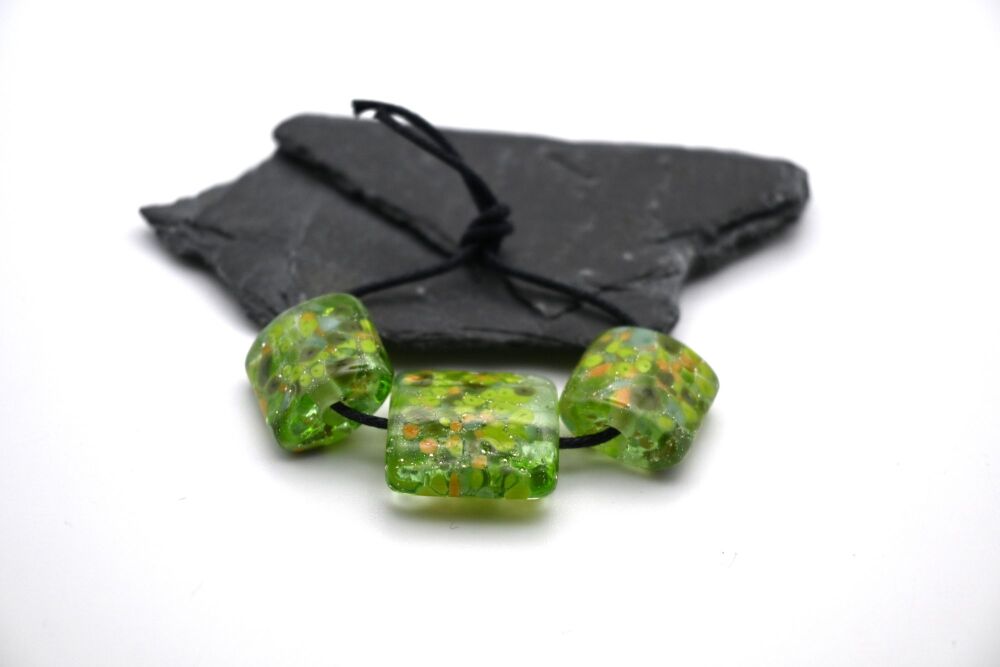 green and silver pillows