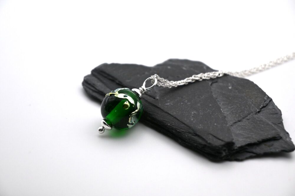 green sphere silver shards